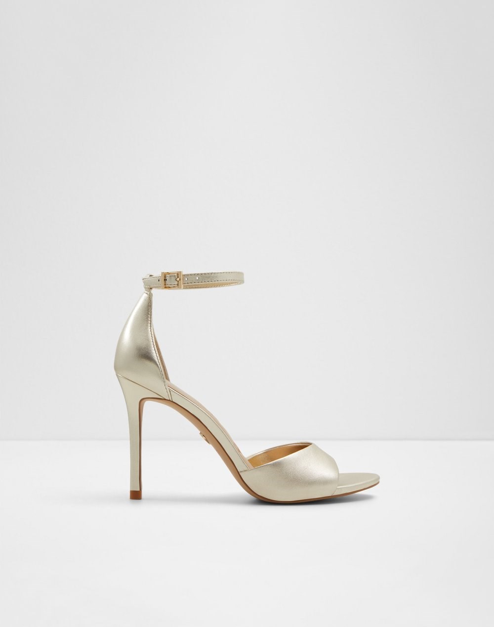 Aldo sandale na visoku petu CRERIDE LEA METALLIC - zlatna