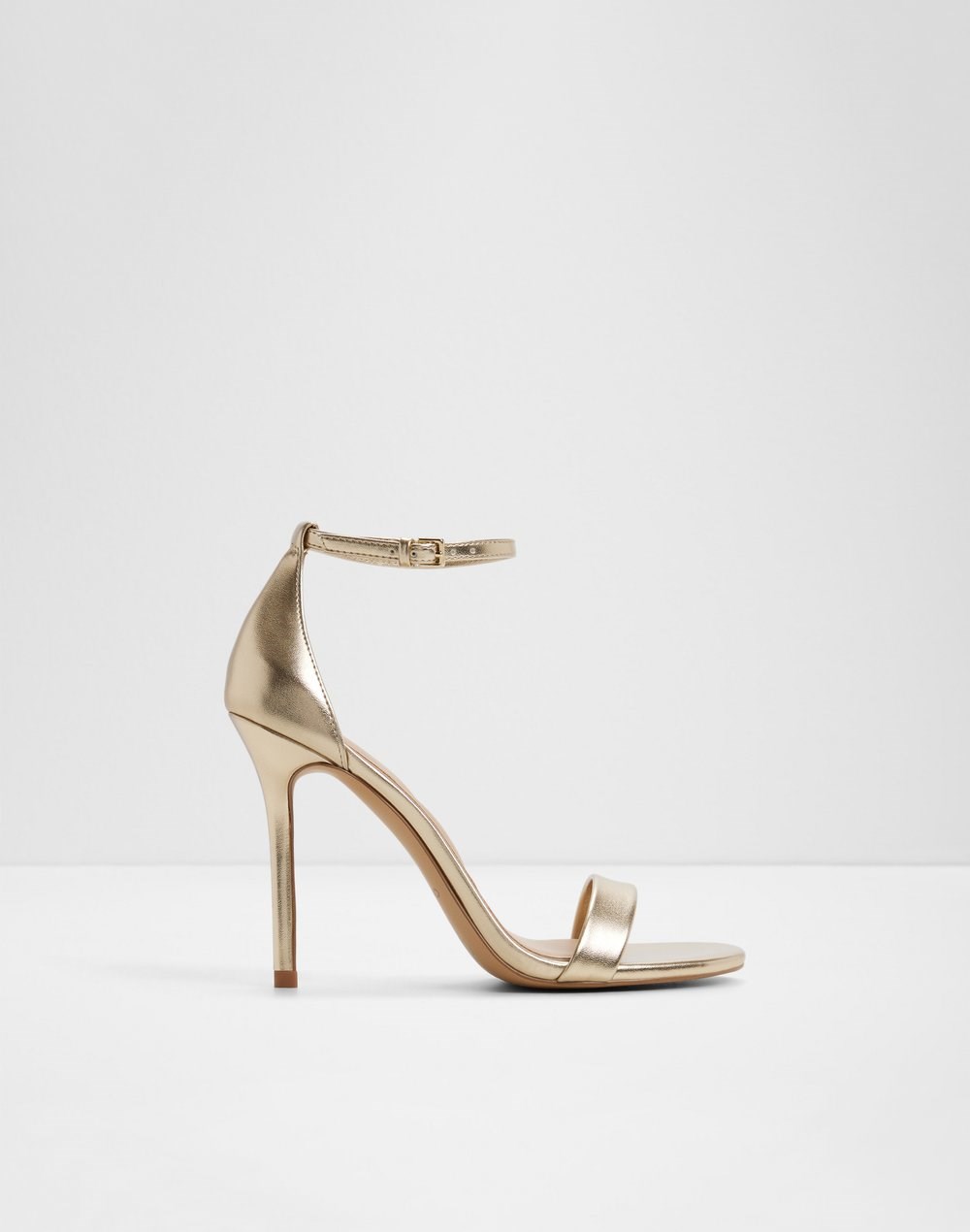 Aldo sandale na visoku petu JACYNTHE SYN METALLIC - zlatna